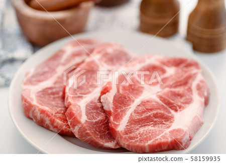 Raw fresh pork neck meat steaks Raw fresh pork neck meat steaks 58159935
