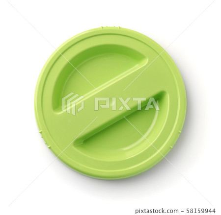 Top view of green round plastic lid Top view of green round plastic lid 58159944