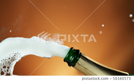 Splashing champagne wine from bottle Splashing champagne wine from bottle 58160573