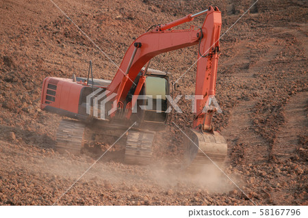Orange excavator Under construction Large Orange excavator Under construction Large 58167796