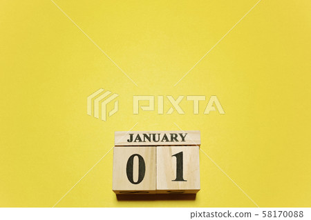 JANUARY01 (January 1) wooden calendar and yellow paper copy space 58170088