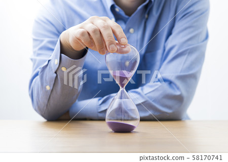Businessman hourglass 58170741