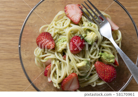Cold pasta with salmon and avocado 58170961