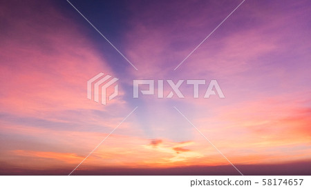 Beautiful view of sky and cloud at dusk,Sky Bright Blue Orange And Yellow Colors in twilight after sunset time. 58174657