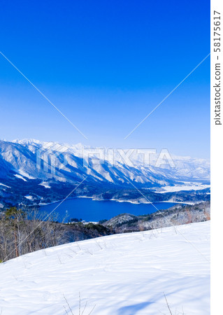 Lake Aoki and the Northern Alps viewed from Omachi City 58175617