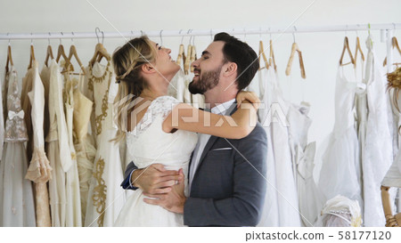 Bride and groom in wedding dress prepare ceremony. 58177120