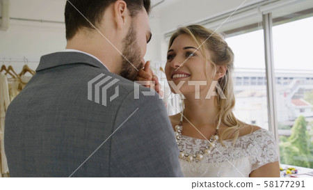 Bride and groom in wedding dress prepare ceremony. Bride and groom in wedding dress prepare ceremony. 58177291