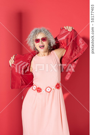 Mature woman showing her femininity and confidence Mature woman showing her femininity and confidence 58177403