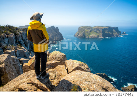 Trekking in Tasman Peninsula, Tasmania, Australia. Trekking in Tasman Peninsula, Tasmania, Australia. 58177442
