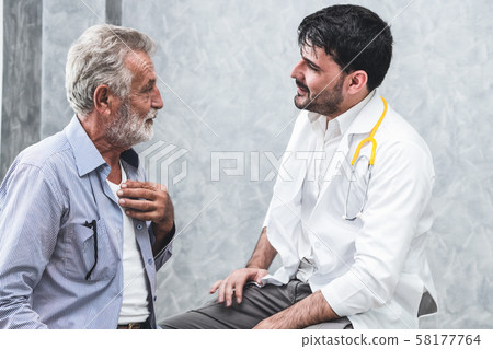 Senior patient visits doctor at the hospital. Senior patient visits doctor at the hospital. 58177764