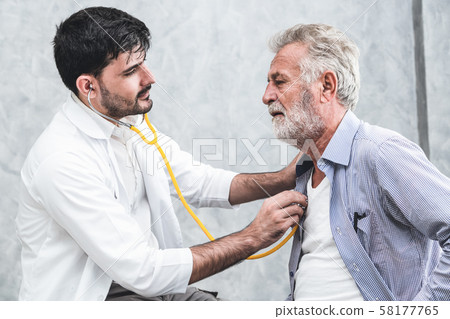 Senior patient visits doctor at the hospital. Senior patient visits doctor at the hospital. 58177765