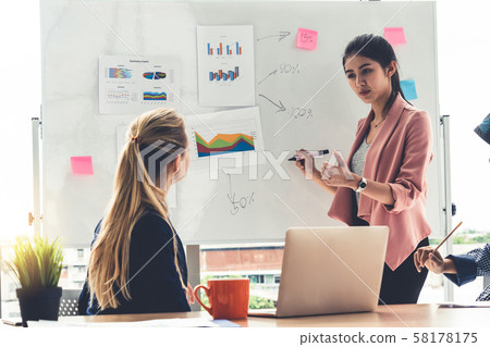 Multicultural working group in teamwork meeting. Multicultural working group in teamwork meeting. 58178175