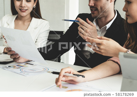 Businessman and businesswomen working in office. Businessman and businesswomen working in office. 58178269