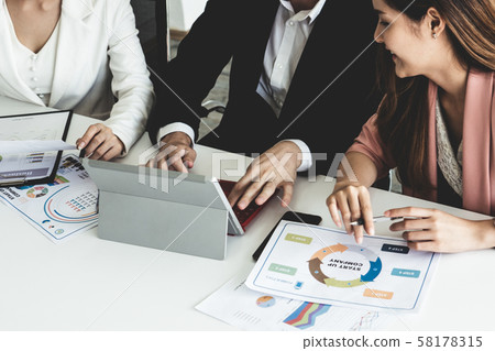 Businessman and businesswomen working in office. Businessman and businesswomen working in office. 58178315