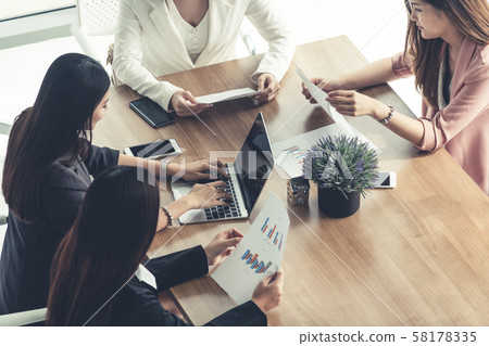 Businesswomen in Meeting, Laptop Computer on Table 58178335