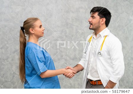 Doctor and nurse working in hospital. 58179647