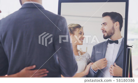 Bride and groom in wedding dress prepare ceremony. Bride and groom in wedding dress prepare ceremony. 58180386