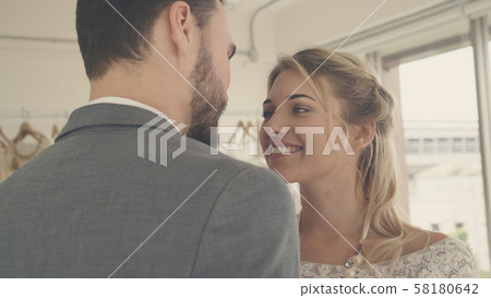 Bride and groom in wedding dress prepare ceremony. Bride and groom in wedding dress prepare ceremony. 58180642