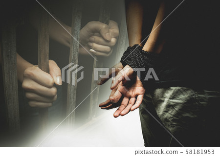 a woman tie up with rope, human trafficking concept 58181953