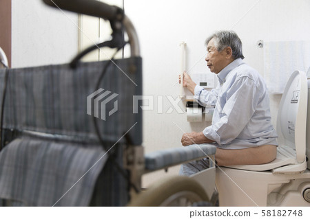 Senior man using a disabled toilet 58182748