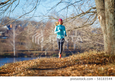 Fitness girl training running in the morning park Fitness girl training running in the morning park 58183544