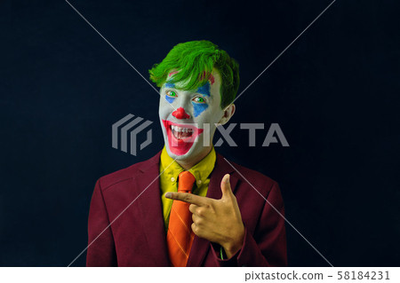 Man in clown makeup 58184231