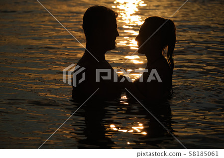 silhouettes in love romantic couple lovers silhouettes in love romantic couple lovers 58185061