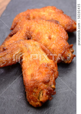 Deep fried chicken wings 58191435
