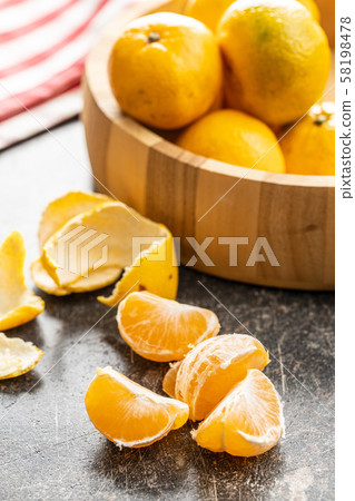 Fresh yellow tangerines. Fresh yellow tangerines. 58198478