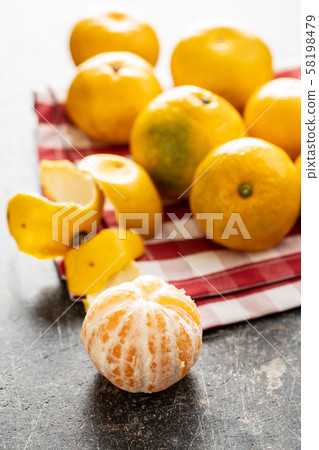 Fresh yellow tangerines. Fresh yellow tangerines. 58198479