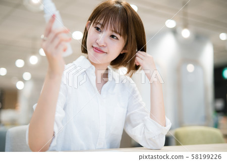 Young woman in charge of cosmetic product planning 58199226