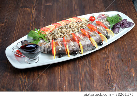 Stuffed fish with vegetables and rice. catering menu 58201175