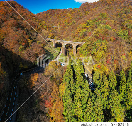 Aerial view of autumn leaves, scenery of Megane bridge in Gunma prefecture, autumn 58202996