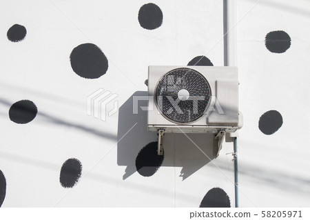 air compressor on the wall outdoor 58205971