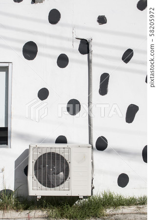 air compressor on the wall outdoor 58205972