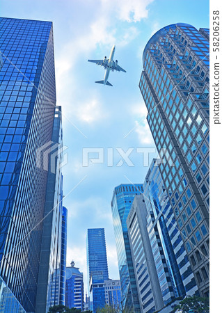 Jetliner flying over the financial center of Yeouido, Seoul Jetliner flying over the financial center of Yeouido, Seoul 58206258