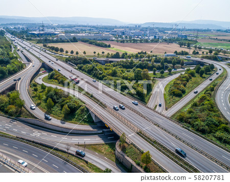 Aerial view of a highway intersection with a clover-leaf interchange Germany Koblenz Aerial view of a highway intersection with a clover-leaf interchange Germany Koblenz 58207781