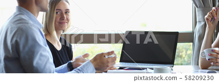 Business meeting in a cafe young beautiful men 58209230