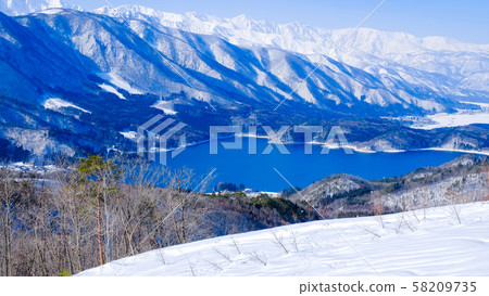 Lake Aoki and the Northern Alps viewed from Omachi City 58209735