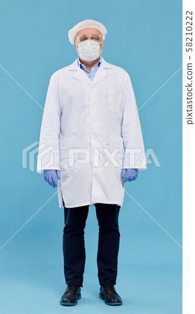 Chemist in protective workwear 58210222