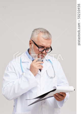 Doctor with medical card 58210456
