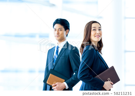 Business image Male employee Female employee 58211231
