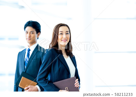 Business image Male employee Female employee 58211233