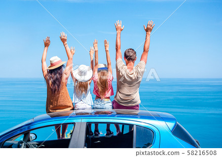 Summer car trip and young family on vacation Summer car trip and young family on vacation 58216508