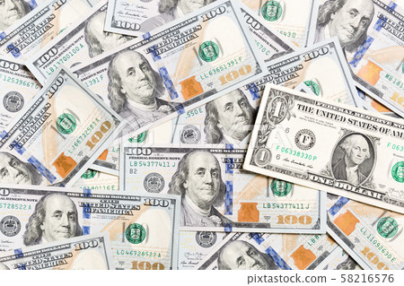 1 dollar bill on various US Dollar billss Top view 1 dollar bill on various US Dollar billss Top view 58216576