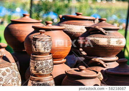 Hand made ceramic pottery on autumn open fair Hand made ceramic pottery on autumn open fair 58218087