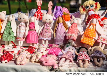 Large assortment of rag animal dolls on fall fair Large assortment of rag animal dolls on fall fair 58218091