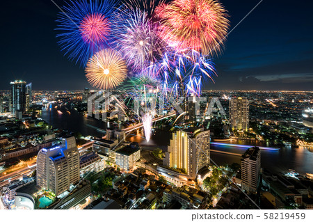 Beautiful fireworks celebrating new year along 58219459