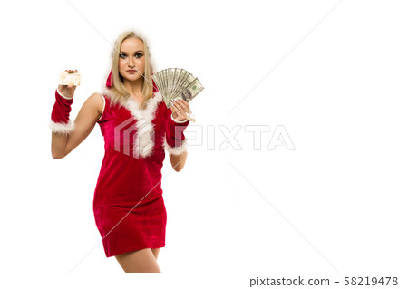 A beautiful sexy woman in a New Year's dress, hold A beautiful sexy woman in a New Year's dress, hold 58219478