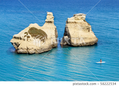 The Two Sisters stacks in front of the shore of The Two Sisters stacks in front of the shore of 58222534